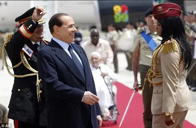 gaddafi female guards with silvio berlusconi