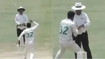 Hasan Ali while raising umpire's finger