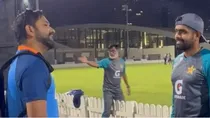 Babar Azam talking to Rohit Sharma