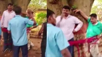 Dumka Teacher Tied by Tree 