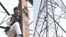 aap former councillor haseeb ul hasan climbs tower after not getting ticket in mcd elections delhi 