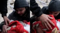video shows father crying infant died in earthquake Syria turkey