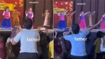 father helping his daughter in school annual function viral video