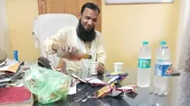 man drinking alcohol sitting on police station in charge chair saharanpur