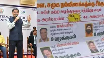 DMK supporters stick posters of union cabinet ministers who have cases against them.