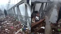 viral video of river throws back heaps of trash