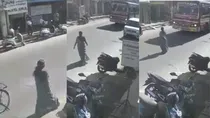 viral video of woman jumps in front of bus
