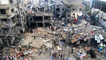 Palestinians in Gaza's Al Shifa Hospital dug a mass grave to burry dead inside.