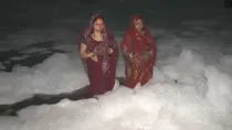 People were forced to pray for Chhath Puja in the polluted foam water of Yamuna River in Delhi.