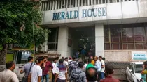 congress national herald case ed issue order in money laundering case to attach properties worth crores 