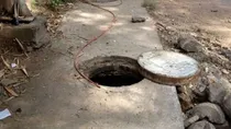Dalit students made to clean septic tank in a Karnataka School. 