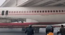 bihar news: airplane stuck under overbridge in motihari 