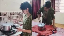woman using pressure cooker insted of iron