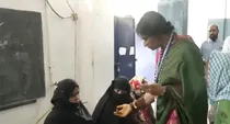 Hyderabad madhavi latha bjp candidate case file on her checking voter id remove burka muslim women