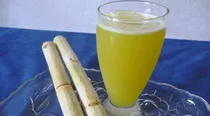 served sugarcane juice mixed with spit