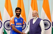 Jasprit Bumrah with PM Modi (photo-PTI)