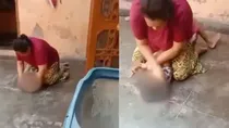 haridwar woman brutally beating son viral video drama to scare husband says police