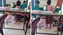 aligarh school viral video teacher caught sleeping kids fanning classroom principal suspended up