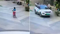 four year old crushed to death by car while riding bicycle in society mehsana gujarat cctv 
