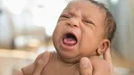 why newborns don't cry tears reason behind it