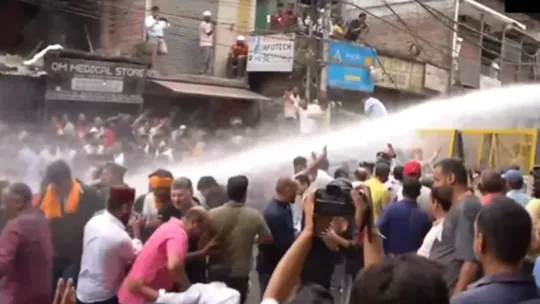 himachal mandi protest over demolition of alleged illegal mosque police use water cannon shimla 