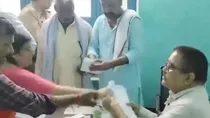 bjp mla manju tyagi viral video snatched away nomination papers election officer sdm up sp