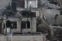 Israeli soldiers video viral pushing dead bodies from roofs during a West Bank raid