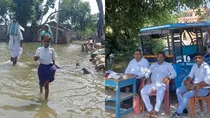 Bihar munger flood water enters inside school teachers seen working roadside