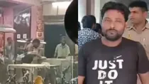 man spitting on roti 