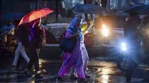 mumbai heavy rainfall four dead schools shut imd forecast waterlogging red orange alert pm visit