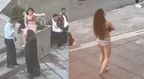 Woman strips off clothes at Iran university