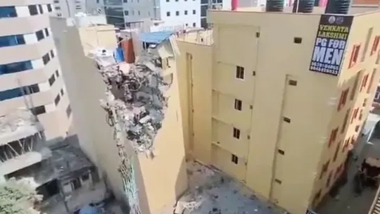 hyderabad five storey building dangerously tilting video viral evacuated demolished safety