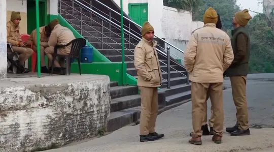 Woman jumps in front of train