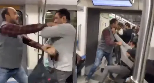 delhi metro two people fighting viral video