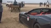 Ferrari got stuck on Revdanda Beach in maharashtra rescued by bullock cart