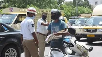 Begging at traffic signals trans women traffic police
