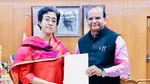 Atishi with LG VK Saxena