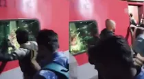 pelting a train with stones at Madhubani railway station