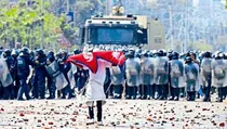 nepal Clash Violence between monarchy supporters and police pm oli curfew imposed in the area 2 people died