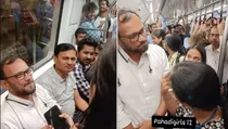 delhi metro viral video male passenger refuses to give up unreserved seat for woman