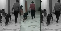 Kerala employee was made to walk like a dog with a leash around his neck workplace harassment viral video 