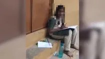 Girl Forced to Take Exam Outside Classroom