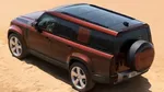 Jaguar Land Rover's plan to assemble its Defender model in India could potentially lead to a price drop of over ₹20 lakh