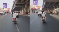 lucknow woman beats husband with sandal on scooter video goes viral
