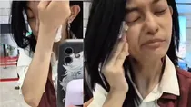 woman stops at Shanghai airport, Asked To Remove Makeup As Face Did not match passport