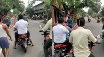 Man carries severed head to police station