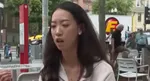 hardvard chinese student  compassion and unity message while two men fight behind video viral