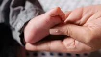 Chinese Woman Sells Two Children to Fund Luxury