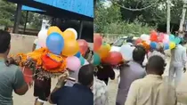 Family Decorates Parents Pyre with Balloons