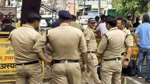 thief wears police uniform